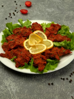 plate-turkish-chig-kofte-raw-meatball-with-tomato-paste-spice_140725-1665 (1)